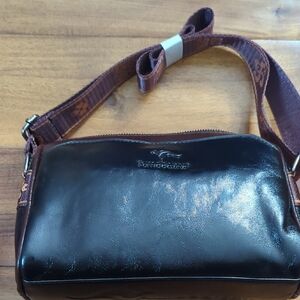 Polished Brown Leather Crossbody Bag with Branded Strap